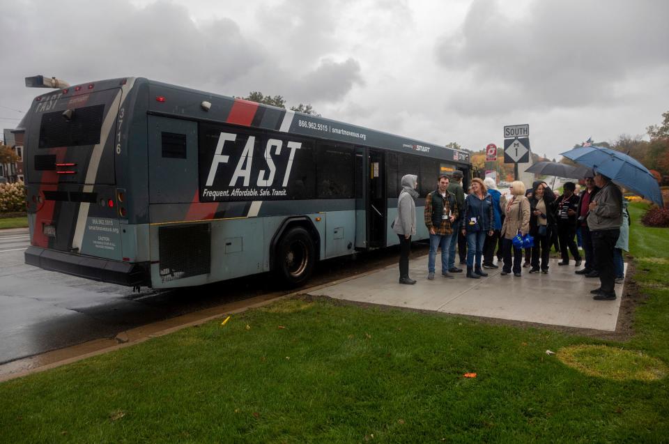 Congregational Church Birmingham, Birmingham Unitarian Church, Oakland County Transit Division and SMART passengers exit a SMART bus at the end of the Bloomfield SMART Bus Trip in Bloomfield Hills on Friday, Oct. 20, 2023.