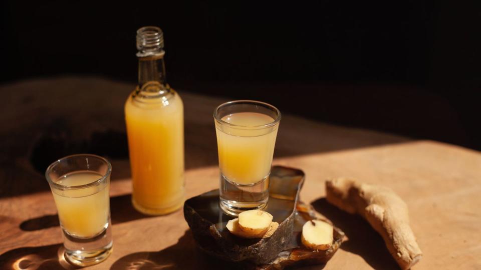 ginger shots on a wooden surface