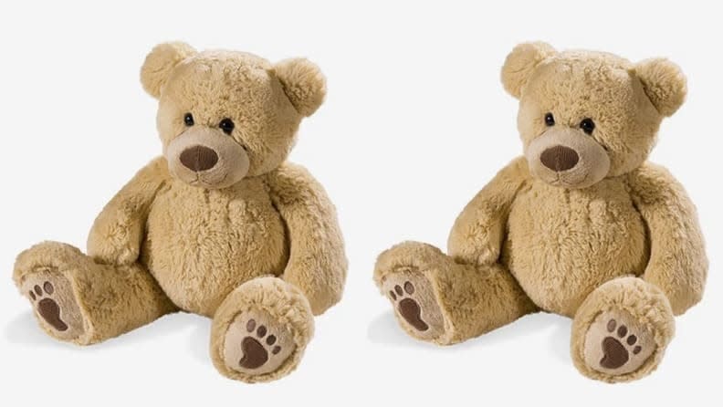 Tucking this cute bear under your arm can actually help you stay in a more comfortable and spine-friendly sleeping position