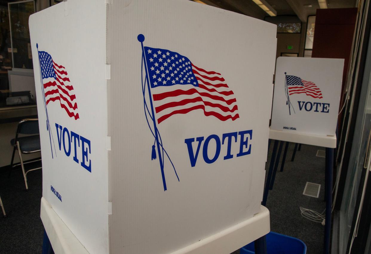 Voting booths wait for Election Day at Lane County Elections in Eugene.