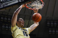 Purdue center Zach Edey (15) gets a dunk against Florida State during the second half of an NCAA college basketball game in West Lafayette, Ind., Tuesday, Nov. 30, 2021. Purdue defeated Florida State 93-65. (AP Photo/Michael Conroy)