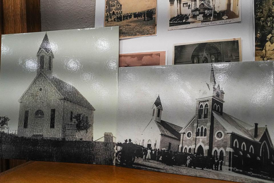 Photos of the original white church and the church that burned in 1928 are displayed at Immanuel Lutheran.