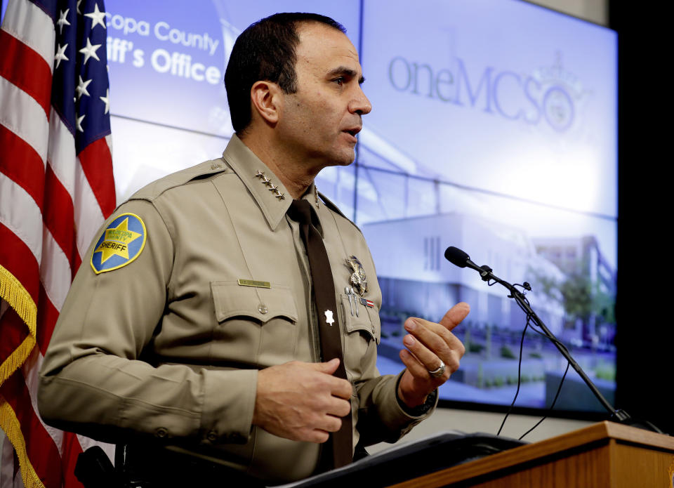 FILE - In this Feb. 14, 2019, file photo, is Maricopa County Sheriff Paul Penzone at a news conference in Phoenix. The taxpayer costs for the racial profiling lawsuit stemming from immigration patrols launched a decade ago by Penzone's predecessor, six-term Sheriff Joe Arpaio, are expected to reach $202 million by the summer of 2022. Officials approved a tentative county budget Monday, May 17, 2021, that provides $31 million for compliance costs in the fiscal year that begins on July 1. No one in county government can say exactly when those costs will start to decline or end. (AP Photo/Matt York, File)