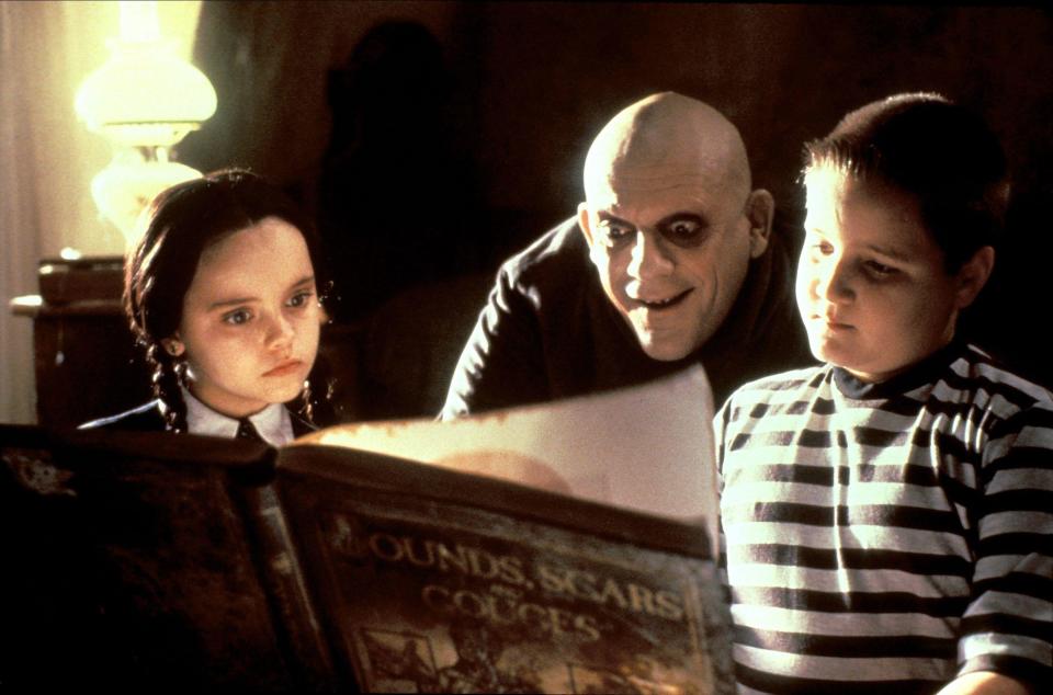 Christina Ricci, Christopher Lloyd, Jimmy Workman Film: The Addams Family (1991) Characters: Wednesday Addams,Uncle Fester,Pugsley Addams  Director: Barry Sonnenfeld 22 November 1991   **WARNING** This Photograph is for editorial use only and is the copyright of PARAMOUNT and/or the Photographer assigned by the Film or Production Company and can only be reproduced by publications in conjunction with the promotion of the above Film. A Mandatory Credit To PARAMOUNT is required. The Photographer should also be credited when known. No commercial use can be granted without written authority from th