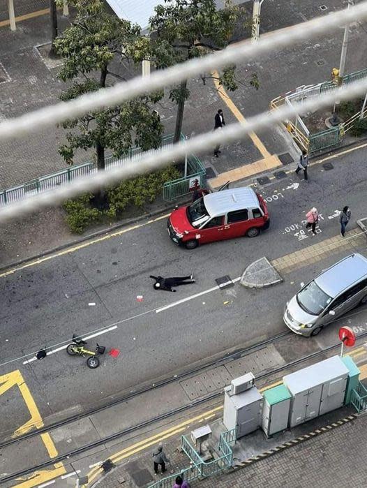 單車女屯門友愛路捱的士撞 倒地送院