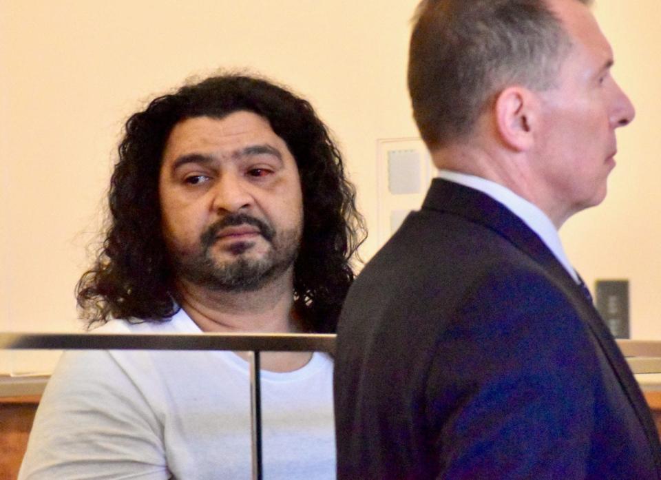 Pedro Fernando Orellano Alvarado, left, seen with his attorney, James Caramanica, was arraigned in Fall River District Court on Monday, March 18, 2024 on a murder charge in the Friday, March 15 stabbing death of Joseph Bump at a Fall River rooming house.