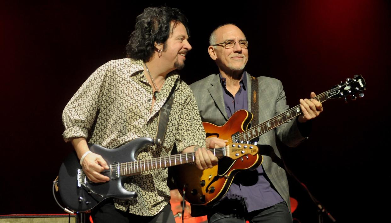  Steve Lukather (left) and Larry Carlton perform onstage at the AC Hall in Hong Kong on February 5, 2015. 