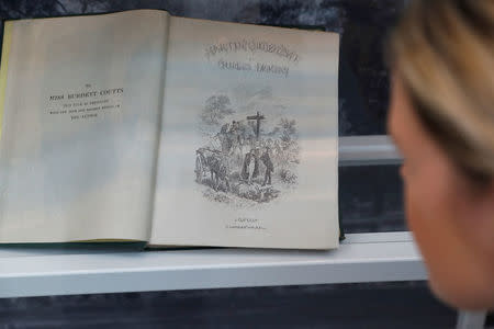 An old copy of a Charles Dickens novel is seen on display inside Coutts private bank in London, Britain October 10, 2017. REUTERS/Peter Nicholls/Files