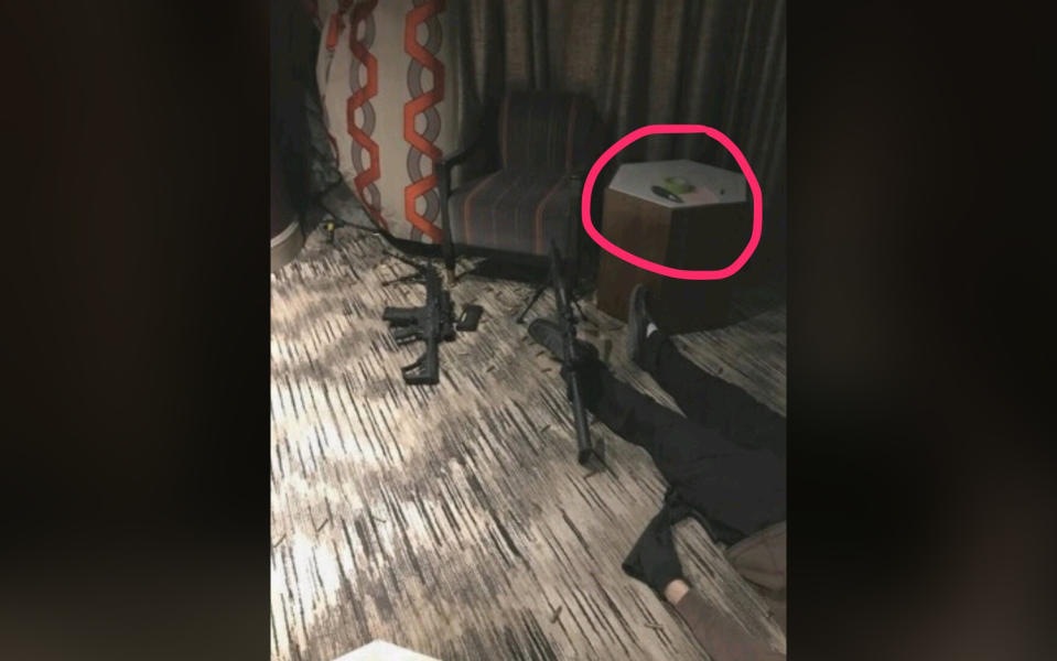 Stephen Paddock’s body is visible in his room at the Mandalay Hotel along with weapons he may have used during his mass shooting at the Route 91 Harvest country music festival in Las Vegas, Nev., on Oct 1, 2017. (Photo: Anonymous)