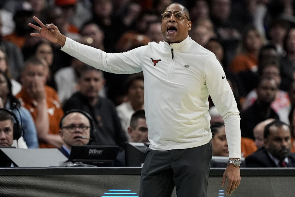 Texas head coach Rodney Terry speaks during the first half of a first-round college basketball game in that NCAA Tournament against Colorado State, Thursday, March 21, 2024, in Charlotte, N.C. (AP Photo/Mike Stewart)