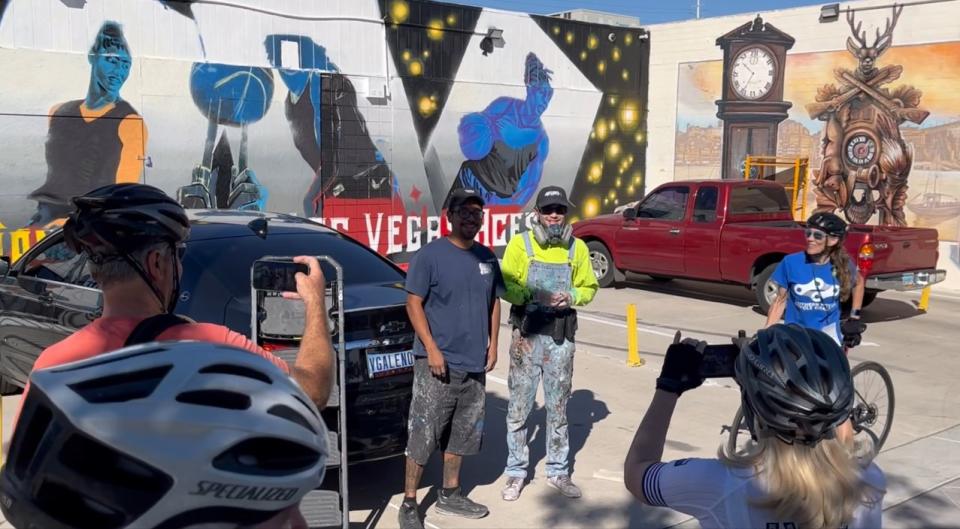 Team of seven local artists painting a mural in Downtown Las Vegas in celebration of the Las Vegas Aces back-to-back WNBA Championship win (KLAS/ Greg Haas)