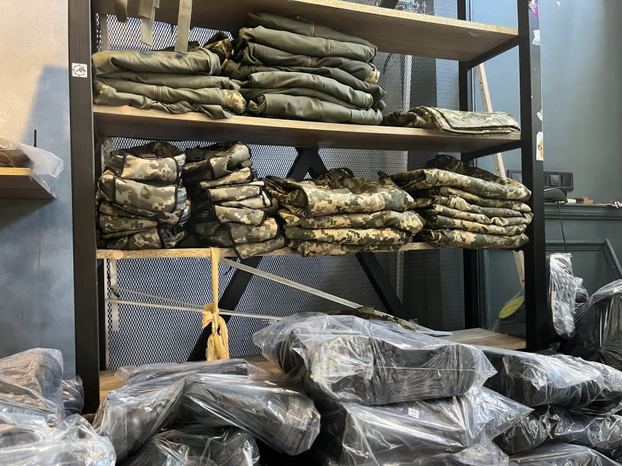 <span>Tactical gear and piles of boots wrapped in plastic. (Laura Kelly/The Hill)</span>