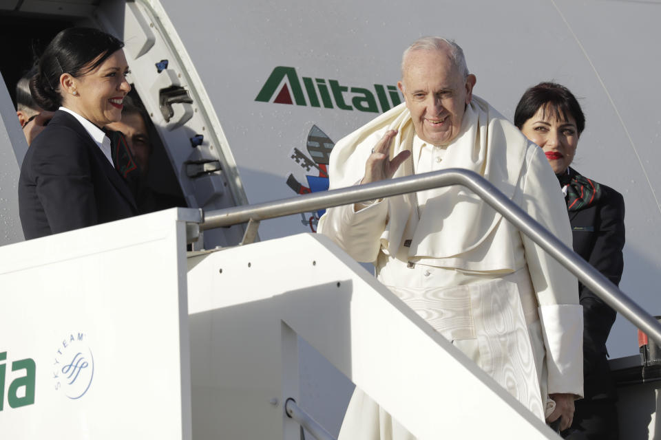 Pope Francis boards an airplane on his way to Panama, at Rome's Fiumicino international airport, Wednesday, Jan. 23, 2019. History's first Latin American pope is the son of Italian immigrants to Argentina and is expected to offer words of hope to young people gathered in Panama for World Youth Day. (AP Photo/Andrew Medichini)