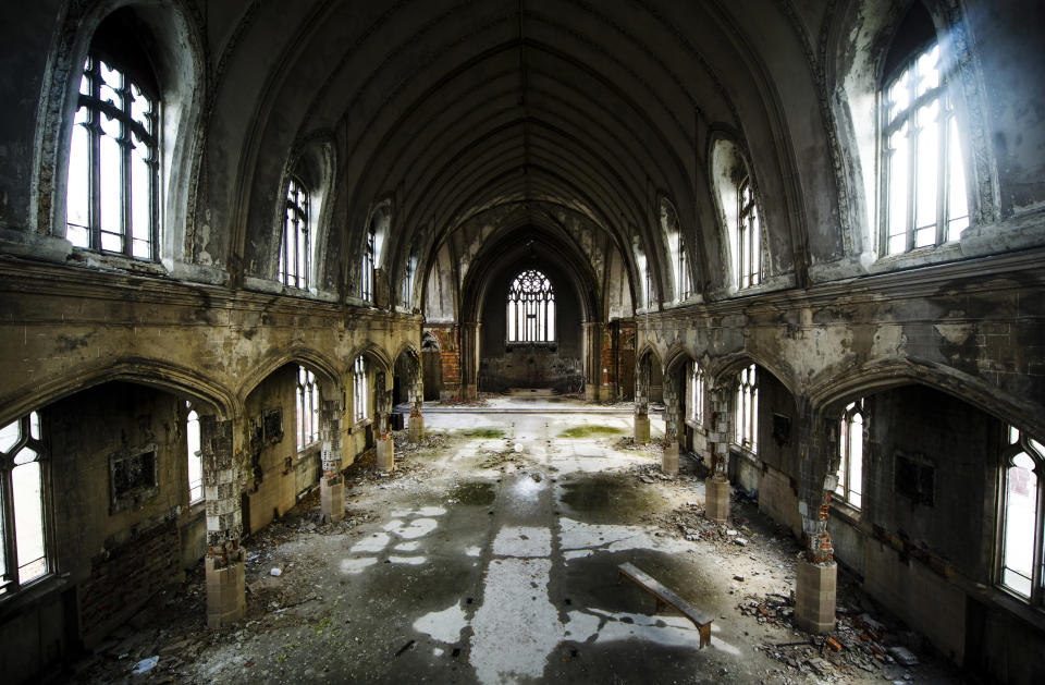 The inside of the abandoned "Martyrs of Uganda Catholic Church is seen in Detroit December 18, 2011. When a Catholic church closes, the land and buildings go back to the archdiocese. The neighboring parishes can come and take their pick of relics or ecclesiastical equipment. If a new tenant doesn't materialize, criminals sometimes do. Thieves often strip the building of copper or pluck out stained glass. The abandoned Martyrs of Uganda church in Detroit, closed by the Archdiocese in 2006, is an example of this decay. REUTERS/Mark Blinch