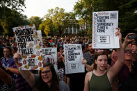 <p>Protesters gather at an event on the campus of the University of Virginia organized by the group Students Act Against White Supremacy marking the one year anniversary of a deadly clash between white supremacists and counter protesters August 11, 2018 in Charlottesville, Virginia. Charlottesville has been declared in a state of emergency by Virginia Gov. Ralph Northam as the city braces for the one year anniversary of the deadly clash between white supremacist forces and counter protesters over the potential removal of Confederate statues of Robert E. Lee and Stonewall Jackson. A ‘Unite the Right’ rally featuring some of the same groups is planned for tomorrow in Washington, DC. (Photo: Win McNamee/Getty Images) </p>