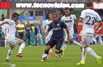 Inter Milan's Pablo Daniel Osvaldo (C) controls the ball during their Serie A soccer match against Sassuolo at San Siro stadium in Milan, September 14, 2014. REUTERS/Stefano Rellandini