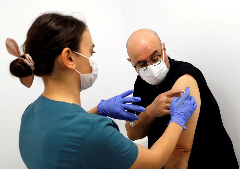 FILE PHOTO: A volunteer is injected an experimental Chinese coronavirus disease (COVID-19) vaccine in Kocaeli