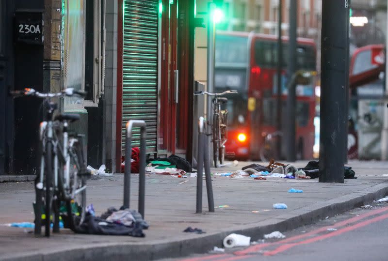 Items laying on the floor near a site where a man was shot by armed officers in Streatham, south London