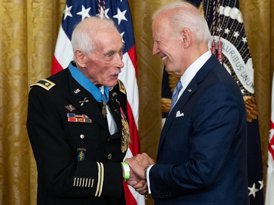 President Joe Biden shakes hands with retired U.S. Army Major John J. Duffy, after awarding him the Medal of Honor for his actions in the Vietnam War, during a ceremony in the East Room of the White House in Washington, D.C., July 5, 2022. / Credit: SAUL LOEB/AFP via Getty Images