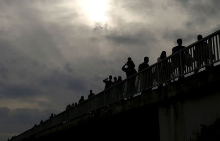 Migrants walk towards the Hungarian border after arriving at the train station in Botovo, Croatia October 6, 2015. REUTERS/Antonio Bronic