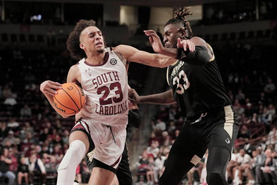 South Carolina’s Devin Carter 23 is defended by Wofford’s B.J. Mack 33 at Colonial Life Arena on Tuesday, November 23, 2021.