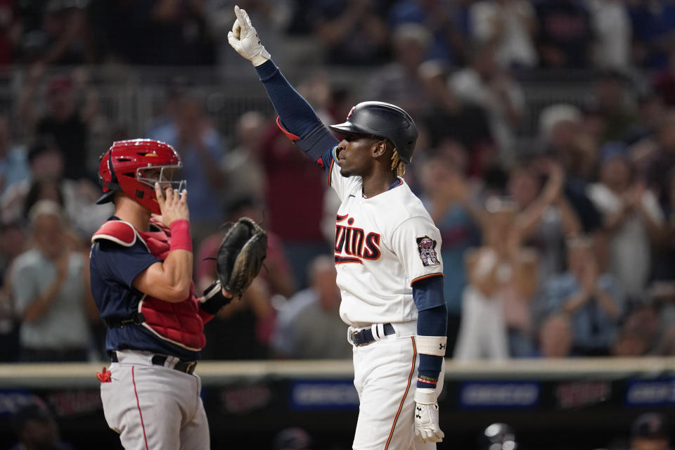 Minnesota Twins' Nick Gordon celebrates while crossing home plate after hitting a grand slam against the Boston Red Sox during the fifth inning of a baseball game Tuesday, Aug. 30, 2022, in Minneapolis. (AP Photo/Abbie Parr)