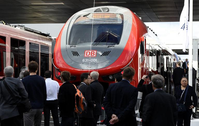 German rail operator Deutsche Bahn displays on of its trains at a transport trade fair in Berlin