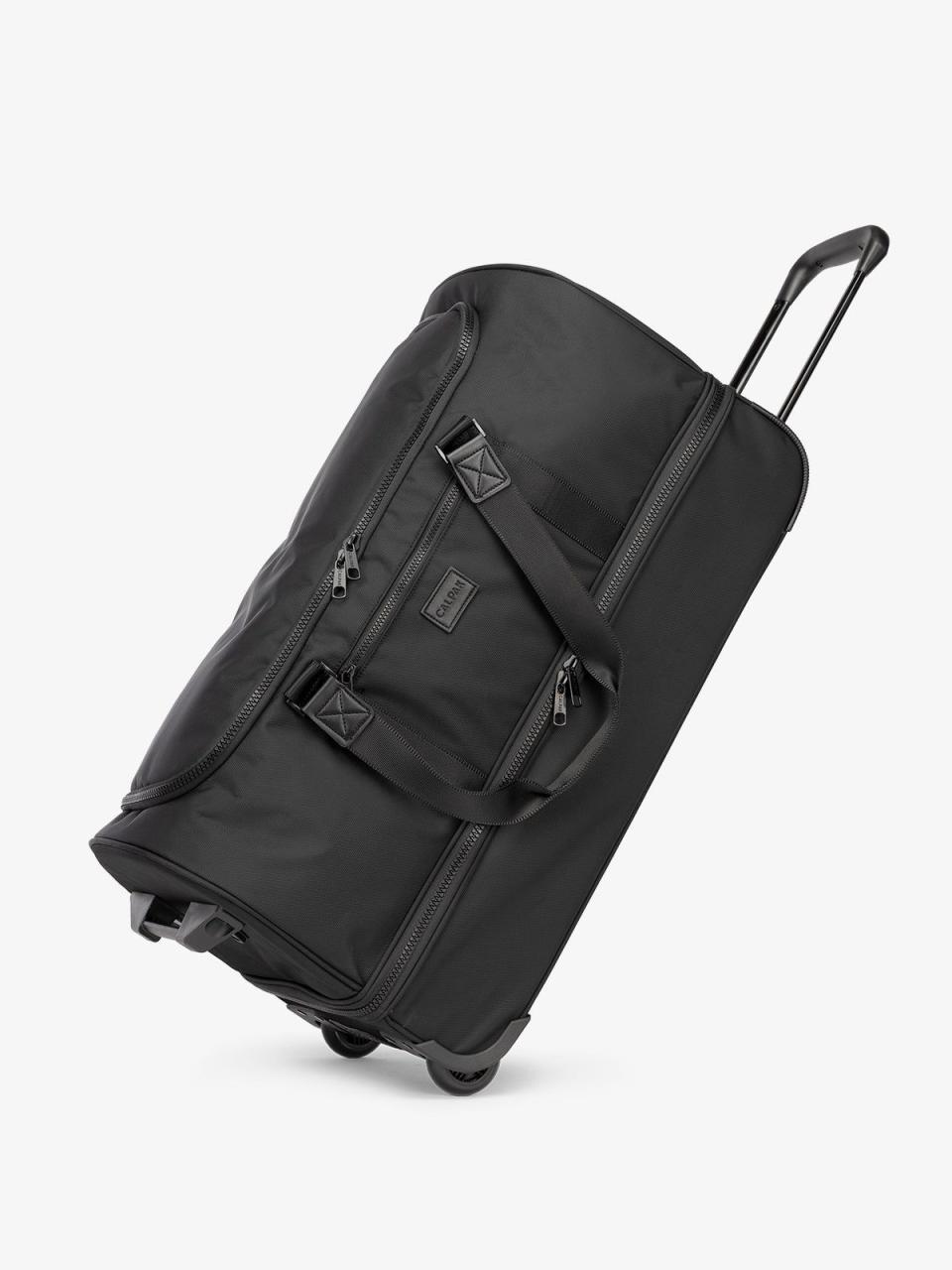 <p><a href="https://go.redirectingat.com?id=74968X1596630&url=https%3A%2F%2Fwww.calpaktravel.com%2Fproducts%2Fstevyn-large-rolling-duffel%2Fblack&sref=https%3A%2F%2F" rel="nofollow noopener" target="_blank" data-ylk="slk:Shop Now;elm:context_link;itc:0;sec:content-canvas" class="link ">Shop Now</a></p><p>Stevyn Large Rolling Duffel</p><p>calpaktravel.com</p><p>$148.00</p>