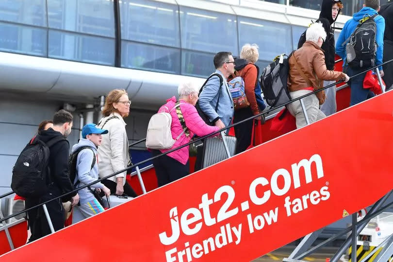 Passengers boarding the Jet2 inaugural flight from Liverpool John Lennon Airport.
