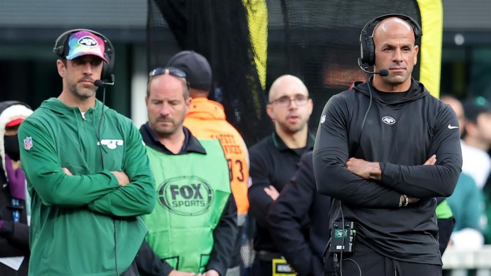Oct 15, 2023; East Rutherford, New Jersey, USA; New York Jets injured quarterback Aaron Rodgers (left) and head coach Robert Saleh on the sidelines during the first quarter against the Philadelphia Eagles at MetLife Stadium. Mandatory Credit: Brad Penner-USA TODAY Sports