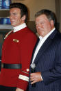 Canadian actor William Shatner (R) poses as he unveils a wax figure of himself as character Captain James T. Kirk from the "Star Trek" television series at Madame Tussauds Hollywood November 4, 2009. REUTERS/Fred Prouser