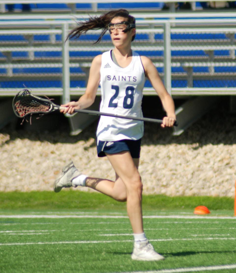 St. Thomas Aquinas' Megan Leahy, shown here in a game last season, scored five goals in Monday's 21-5 win over Coe-Brown in a Division III contest.