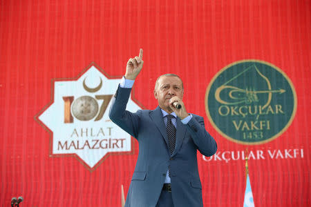 Turkish President Tayyip Erdogan makes a speech during a ceremony in the eastern city of Mus, Turkey August 26, 2018. Murat Cetinmuhurdar/Presidential Palace/Handout via REUTERS