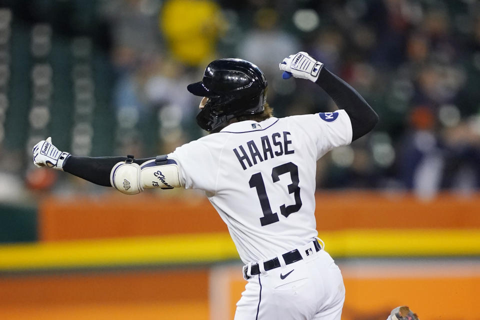 Detroit Tigers' Eric Haase rounds the bases after his solo home run during the fourth inning of a baseball game against the Minnesota Twins, Saturday, Oct. 1, 2022, in Detroit. (AP Photo/Carlos Osorio)
