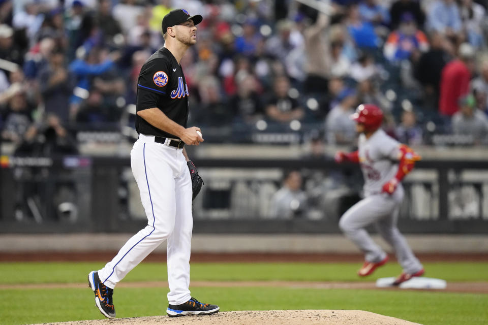 New York Mets starting pitcher Tylor Megill waits as St. Louis Cardinals' Willson Contreras runs the bases after hitting a home run during the fifth inning of a baseball game Friday, June 16, 2023, in New York. (AP Photo/Frank Franklin II)