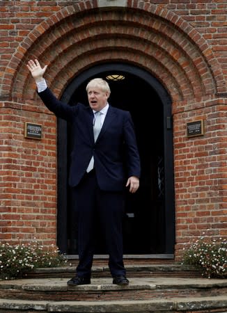 Boris Johnson, a leadership candidate for Britain's Conservative Party, stands outside one of the buildings at Wisley Garden Centre in Surrey