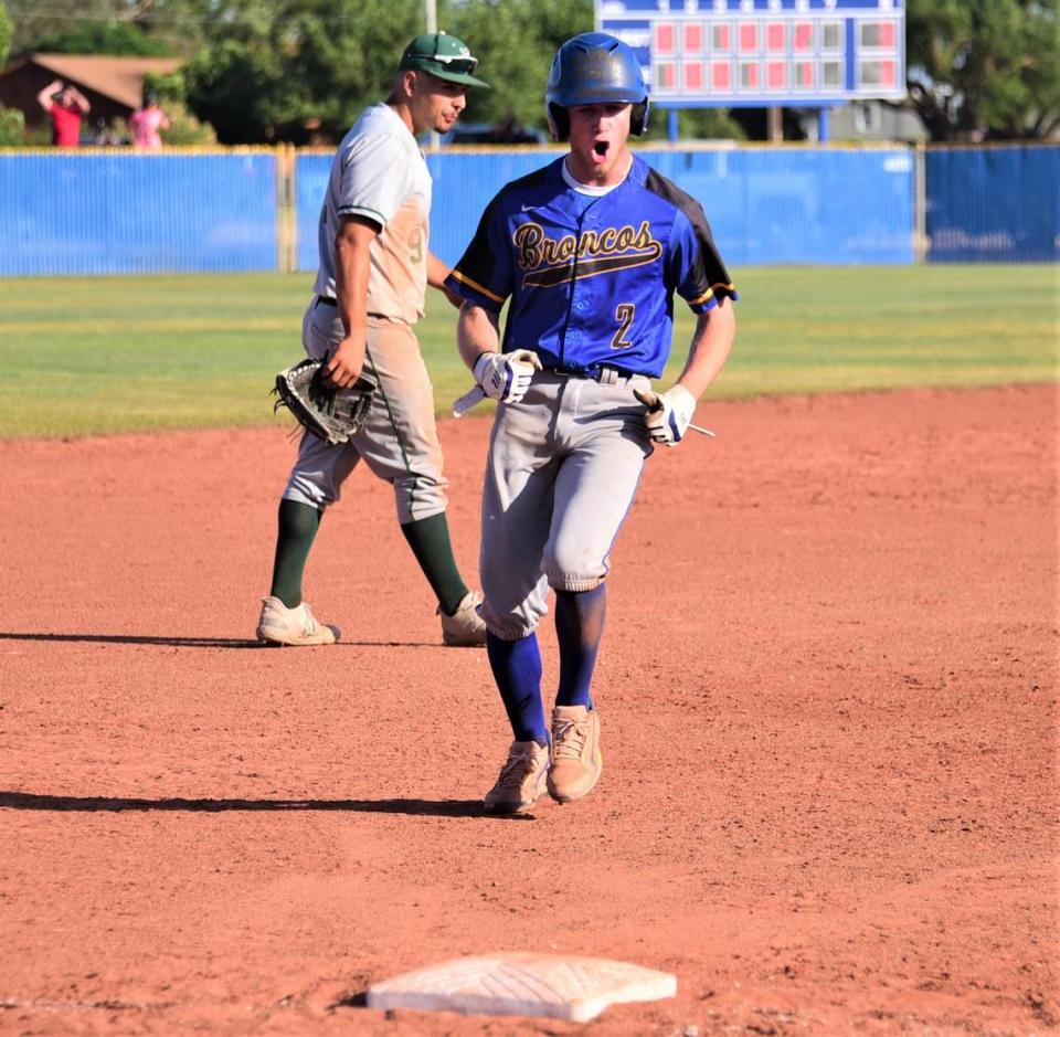 Dos Palos High School junior Drake Hennagan rounds third base after tying the Central Section Division III semifinal game 3-3 against Dinuba with a home run in the sixth inning.