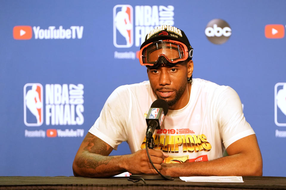 OAKLAND, CALIFORNIA - JUNE 13:  Kawhi Leonard #2 of the Toronto Raptors speaks with the media following his teams victory over the Golden State Warriors to winGame Six of the 2019 NBA Finals at ORACLE Arena on June 13, 2019 in Oakland, California. NOTE TO USER: User expressly acknowledges and agrees that, by downloading and or using this photograph, User is consenting to the terms and conditions of the Getty Images License Agreement. (Photo by Thearon W. Henderson/Getty Images)