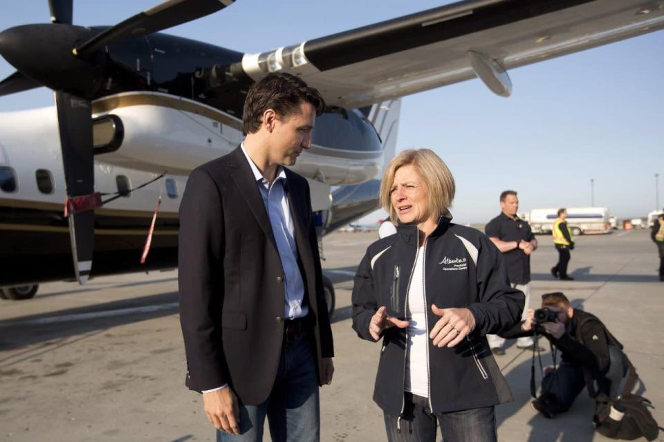 Prime Minister Justin Trudeau meets with Alberta Premier Rachel Notley in Edmonton, Friday, May 13, 2016, before a flight to Fort McMurray. Trudeau is making the visit to see first-hand the devastation caused by the wildfire that forced the evacuation of the city. THE CANADIAN PRESS/Jason Franson