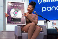 <p>Megan Thee Stallion receives a Billionaire plaque on Aug. 11, commemorating 'billions of spins' on Pandora, at the SiriusXM studios in N.Y.C. </p>