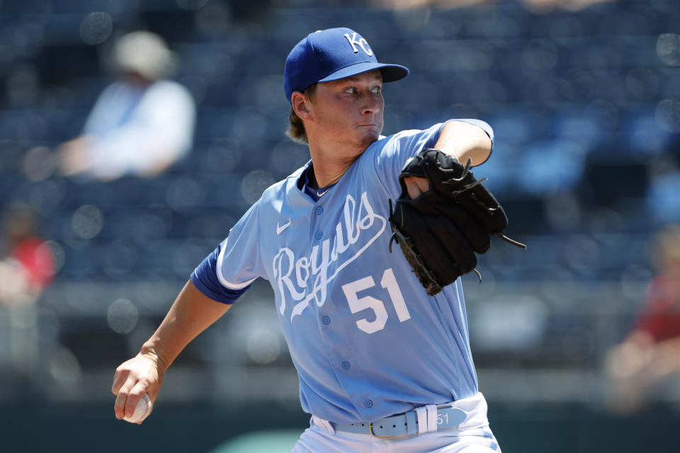 Kansas City Royals pitcher Brady Singer delivers to a Detroit Tigers batter during the first inning of a baseball game in Kansas City, Mo., Wednesday, July 13, 2022. (AP Photo/Colin E. Braley)