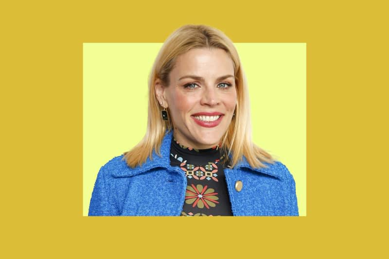 Headshot of Busy Phillipps on colorful background