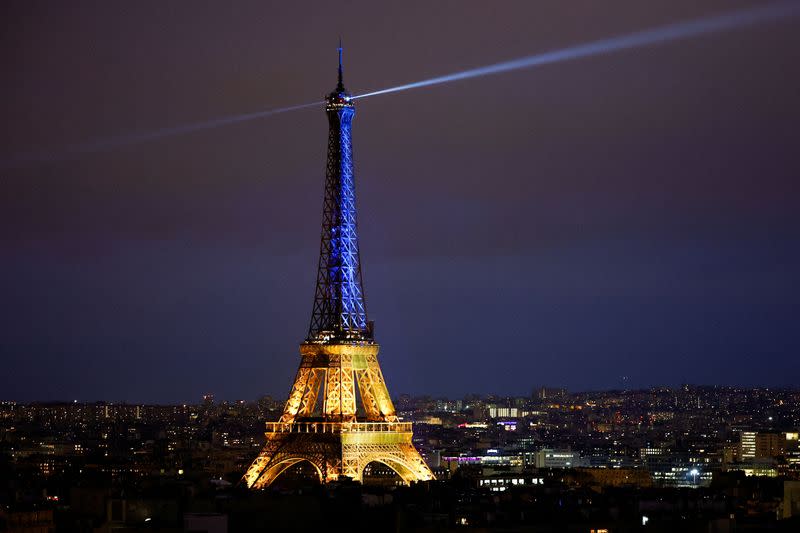 FILE PHOTO: The Eiffel Tower lights up in the colours of Ukraine flag