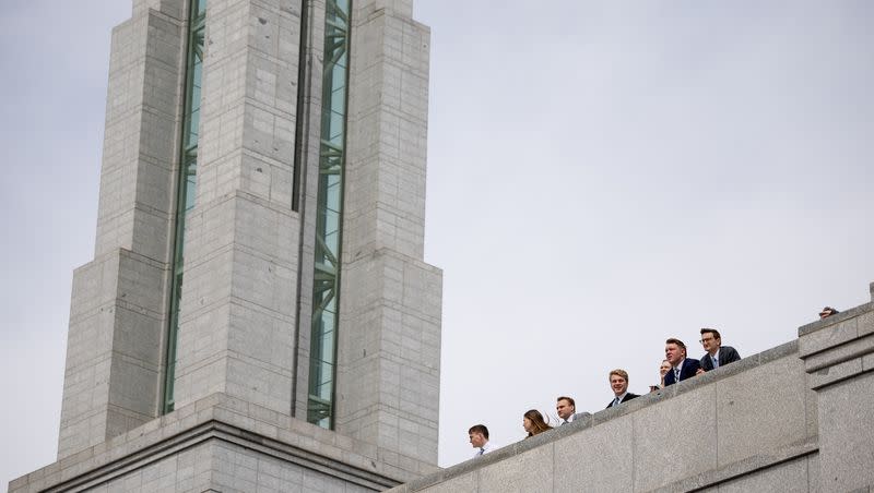 People stand on an upper floor of the Conference Center after the Saturday morning session of the 193rd Annual General Conference of The Church of Jesus Christ of Latter-day Saints in Salt Lake City on Saturday, April 1, 2023.