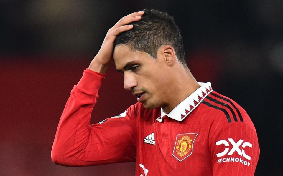 Manchester United's Raphael Varane looks dejected after the match - Peter Powell/Reuters