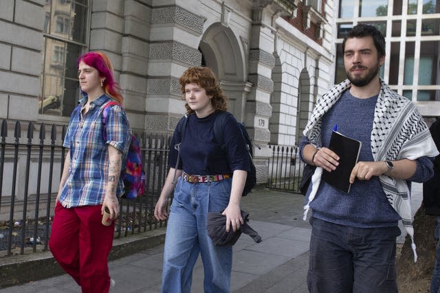 Zosia Lewis, left to right, Daniel Formentin and Leonorah Ward leave Westminster Magistrates’ Court