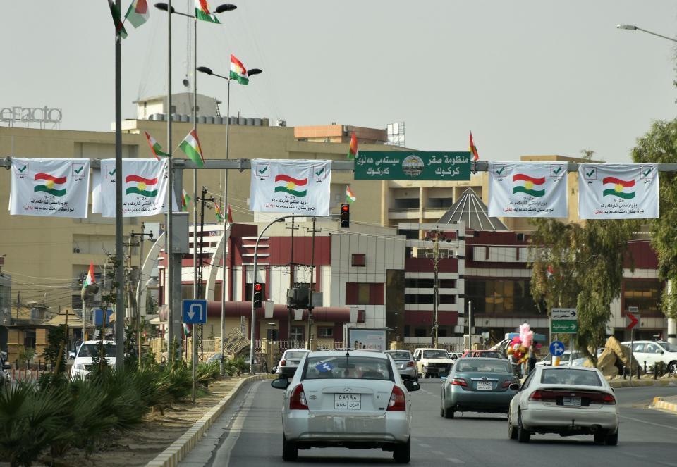 Posters encouraging people to vote in the upcoming independence referendum are seen in central Kirkuk on Sept. 21, 2017.