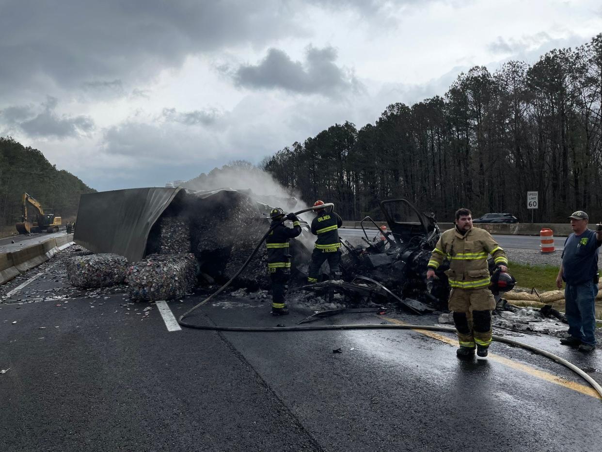 A truck overturned and caught fire on I-65 south in Robertson County on Friday morning, officials reported.