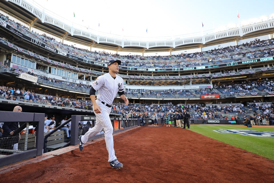 NEW YORK, NEW YORK - OCTOBER 15: Giancarlo Stanton #27 of the New York Yankees takes the field as he is introduced prior to game three of the American League Championship Series against the Houston Astros at Yankee Stadium on October 15, 2019 in New York City. (Photo by Elsa/Getty Images)