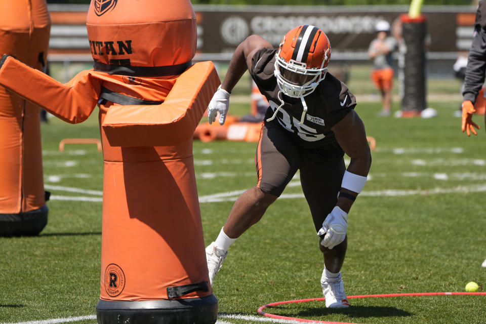 Cleveland Browns defensive end Myles Garrett participates in a drill during an NFL football practice in Berea, Ohio, Wednesday, June 12, 2024. (AP Photo/Sue Ogrocki)
